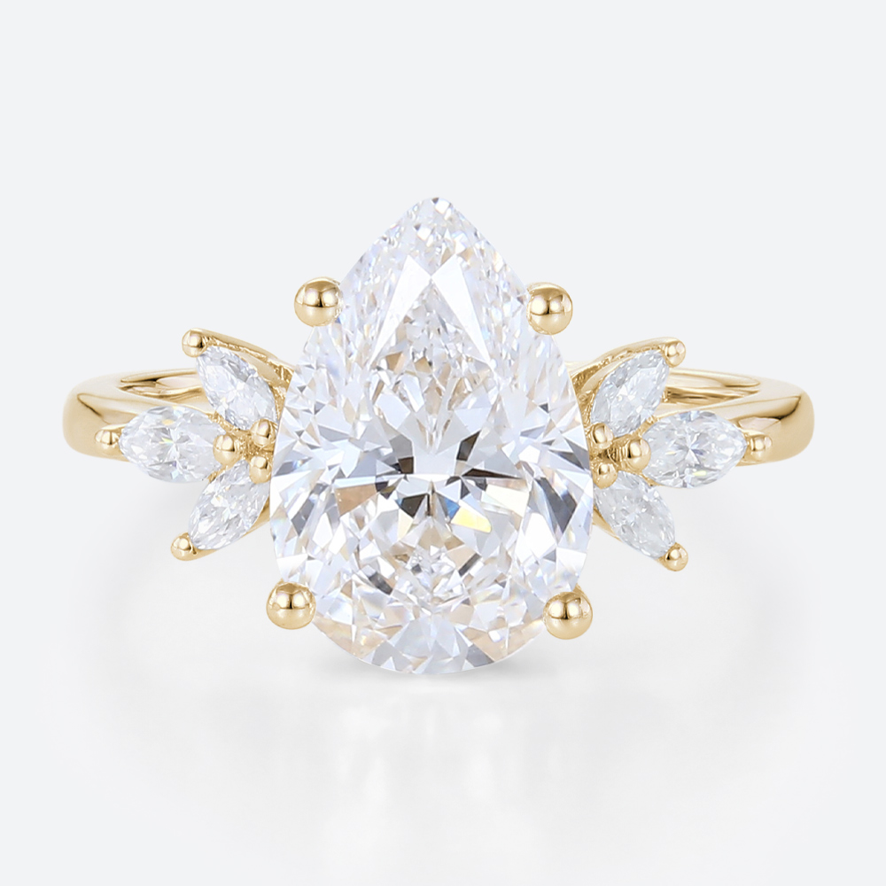 3ct Pear Cut Lab Created Diamond Rings​ Wing-Inspired 4-Prong Ring in Yellow Gold
