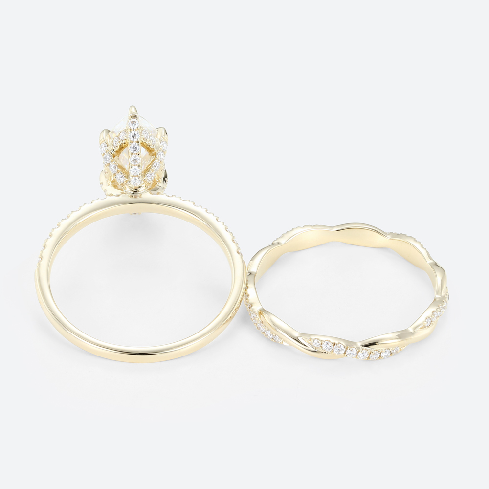 1.5ct Marquise Moissanite Pavé Ring Set with Fully Twisted Band in Yellow Gold