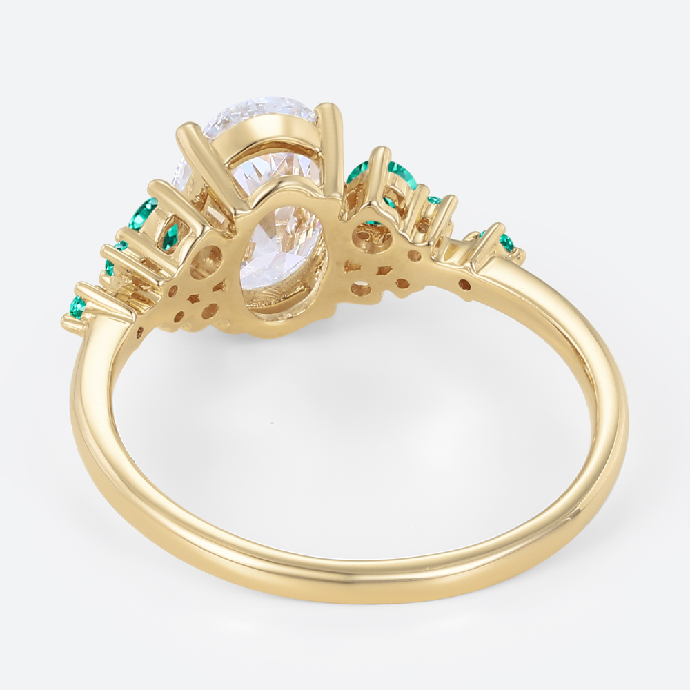 1.5ct Oval Cut Lab Diamond Engagement Ring with Lab Emerald Side Stone Ring in Yellow Gold