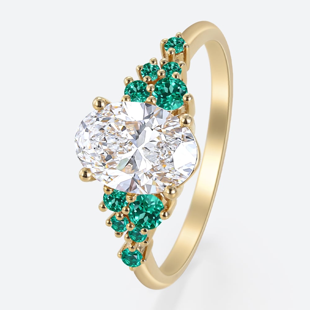 1.5ct Oval Cut Lab Diamond Engagement Ring with Lab Emerald Side Stone Ring in Yellow Gold