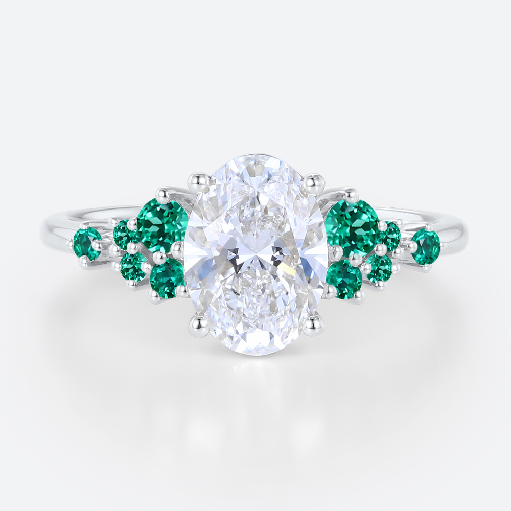 1.5ct Oval Cut Lab Diamond Engagement Ring with Lab Emerald Side Stone Ring in White Gold