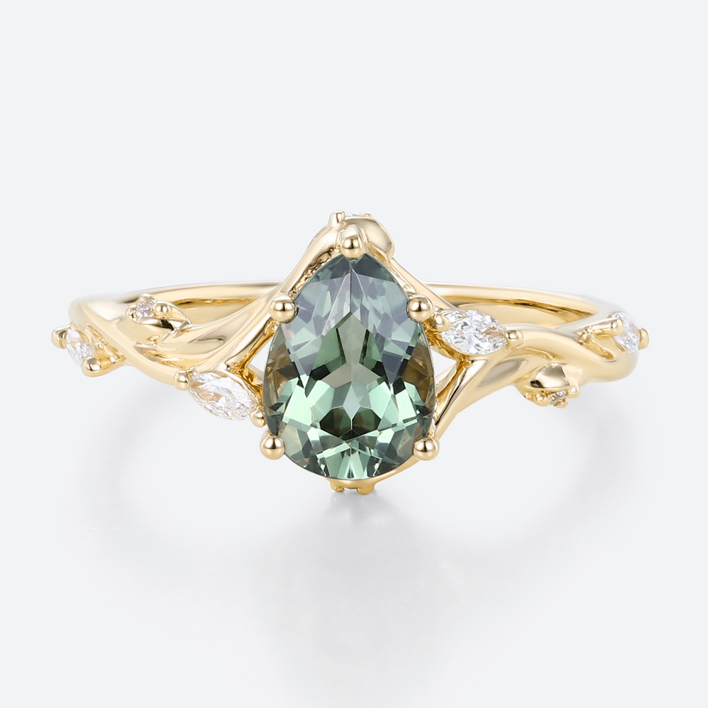 Pear Cut Green Sapphire Engagement Ring​ with Floral Vine Details in Yellow Gold