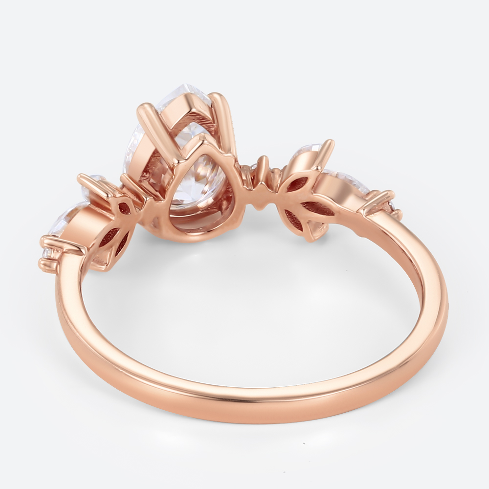Pear Cut Lab Diamond Engagement Ring with Leafy Side Stones in Rose Gold