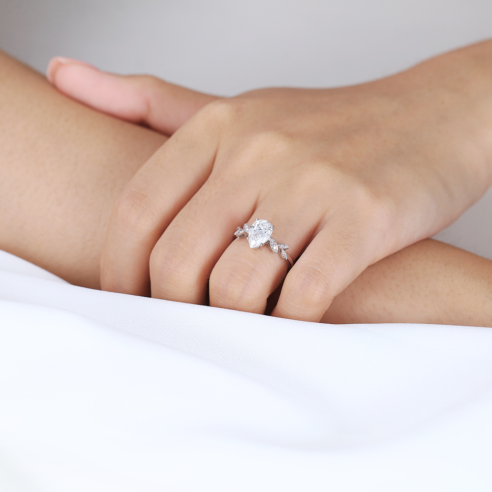 Fall Engagement Ring Trends 2025 - 1 Carat Pear Shaped Diamond Ring with Lab Pink Diamonds Side Stone in White Gold