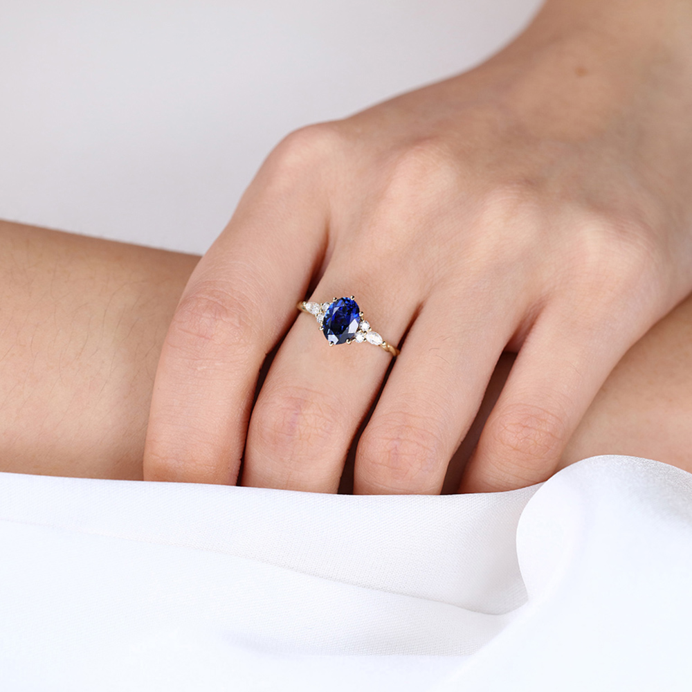 Yellow Gold Oval Cut Lab Sapphire Engagement Ring Cluster Twisted Band