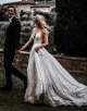 White A-line V-neck Backless Glitter Wedding Dress