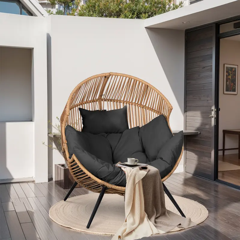 Sillón mecedora de mimbre para interiores y exteriores; silla tipo huevo de gran tamaño con cojín y capacidad de carga de 450 libras; ideal para dormitorio, balcón o jardín.