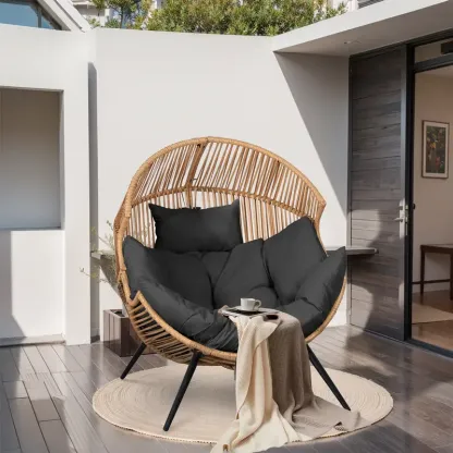 Sillón mecedora de mimbre para interiores y exteriores; silla tipo huevo de gran tamaño con cojín y capacidad de carga de 450 libras; ideal para dormitorio, balcón o jardín.