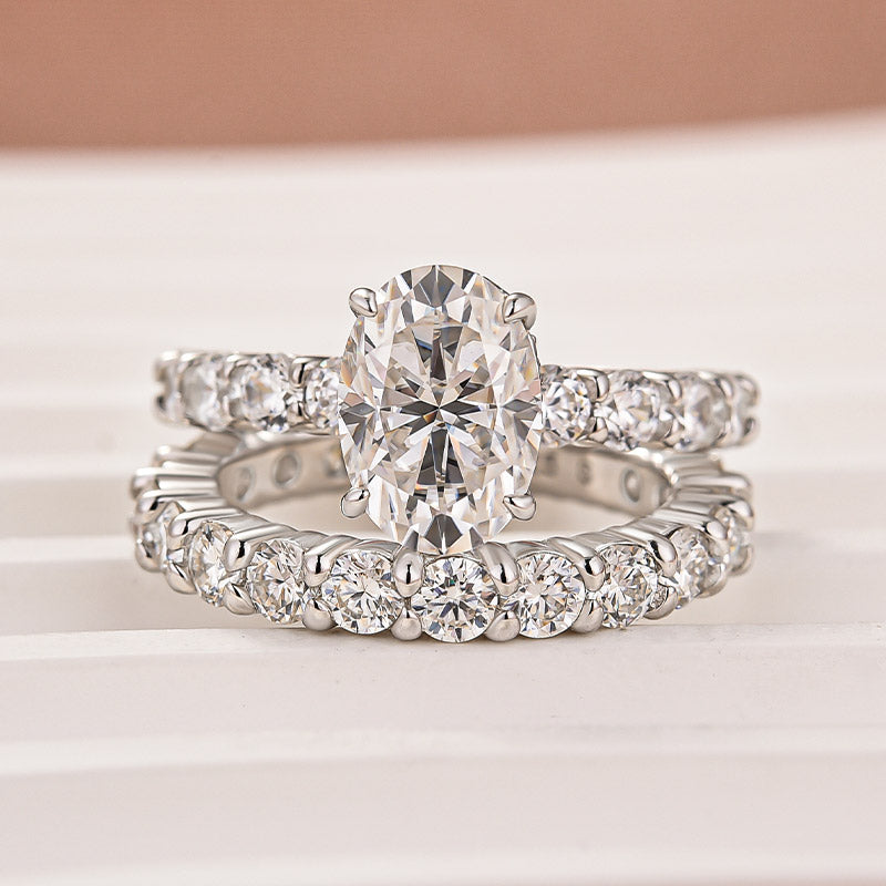 Luna Moissanite 2.0 Ct Oval Cut Side Stone 2-Pc Wedding Ring Set In Sterling Silver