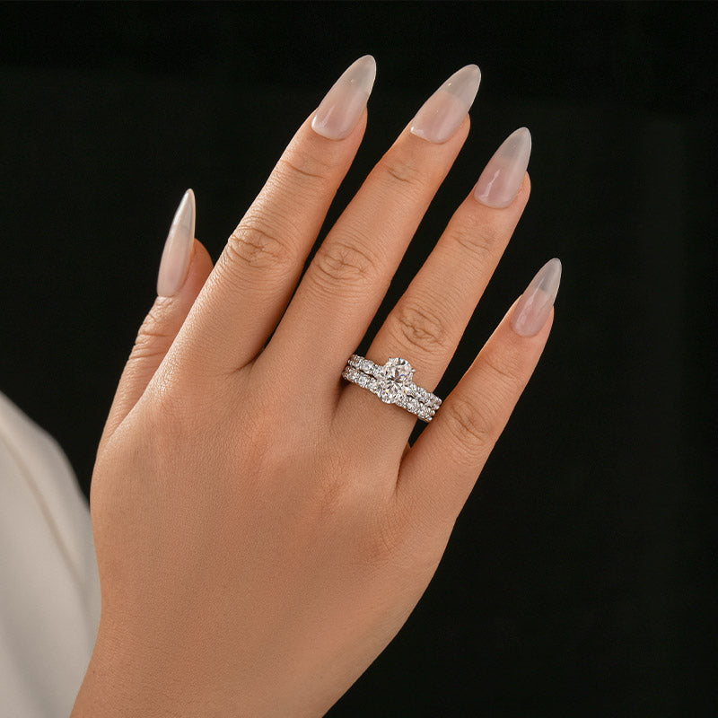 Luna Moissanite 2.0 Ct Oval Cut Side Stone 2-Pc Wedding Ring Set In Sterling Silver