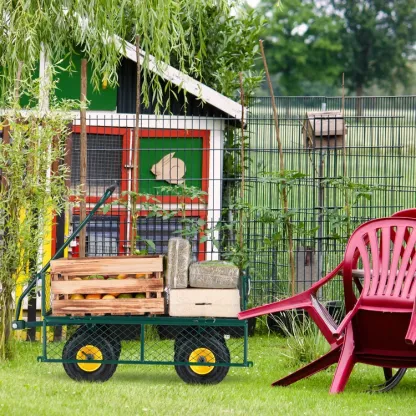 Carro de jardín versátil con capacidad de carga de 408 kg para transportar tierra y grava. Carro con laterales de malla y plataforma plana con ruedas metálicas giratorias.