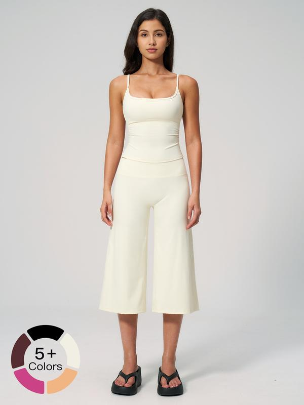 Nuevo conjunto deportivo para mujer: camiseta de tirantes, pantalones de largo medio y talle alto de secado rápido; ideal para yoga, correr y actividades al aire libre. Ropa deportiva cómoda y con estilo.