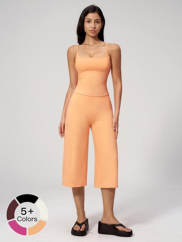 Nuevo conjunto deportivo para mujer: camiseta de tirantes, pantalones de largo medio y talle alto de secado rápido; ideal para yoga, correr y actividades al aire libre. Ropa deportiva cómoda y con estilo.