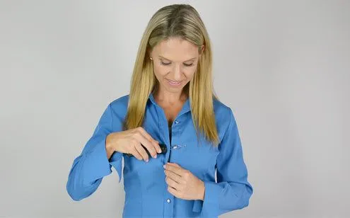 Middle age woman using button hook