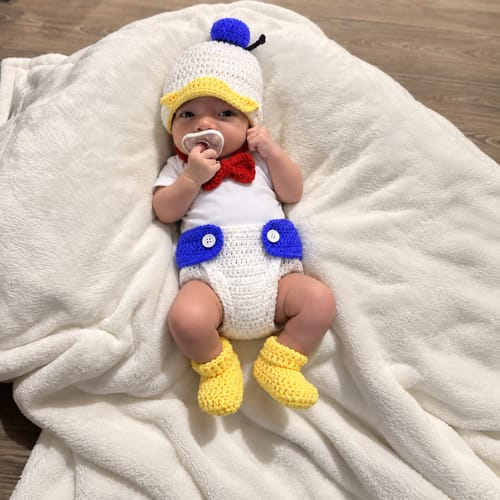 Duck outfit styled for an at-home baby photo