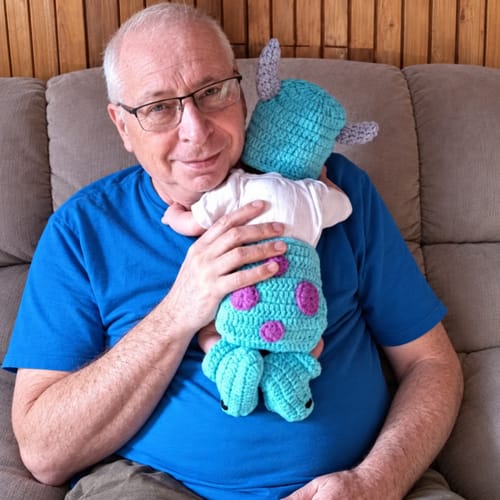Baby wearing a blue character photo outfit
