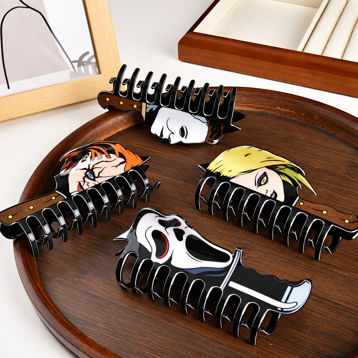 Assorted horror-inspired claw hair clips displayed together