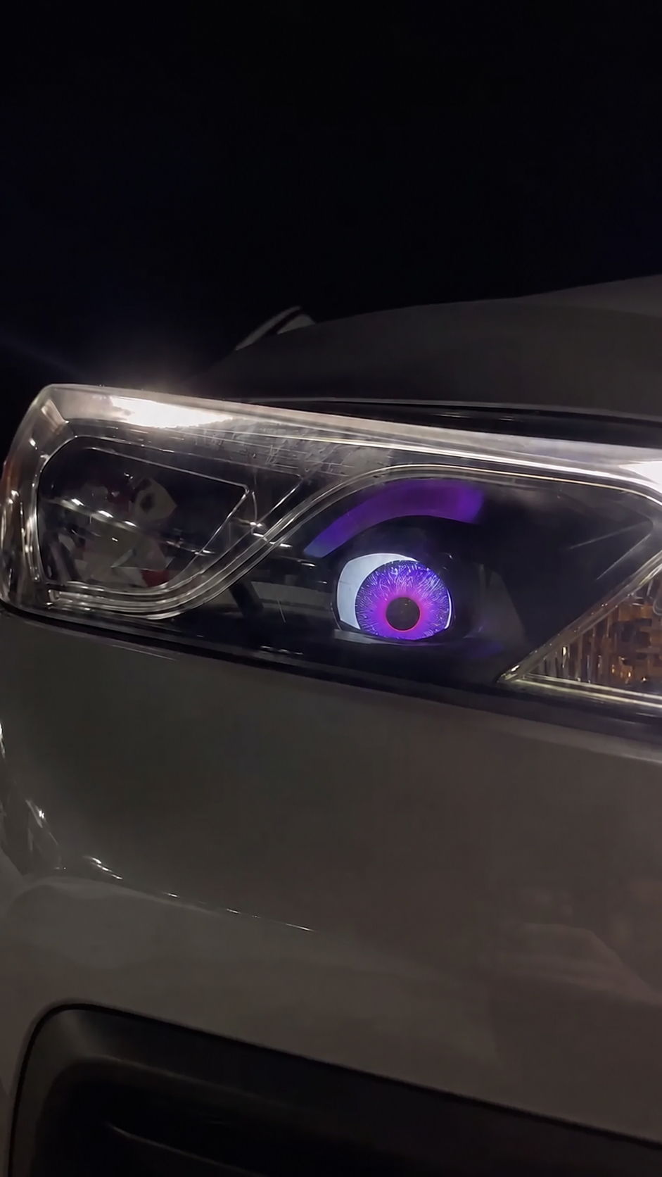 Customer car with a purple 3D eye headlight installed