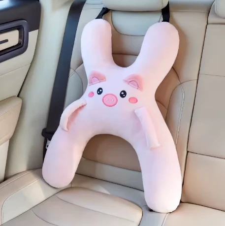 Customer photo of the Pink Pig pillow resting on an empty seat
