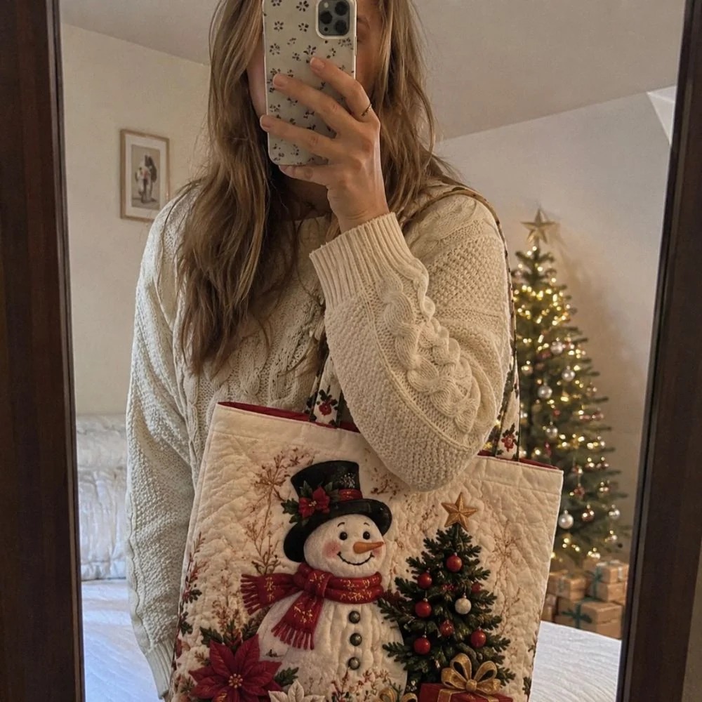 Customer mirror photo carrying the snowman Christmas tote