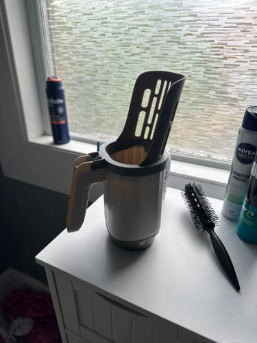 Customer photo of the self-bagging cat litter scoop standing upright