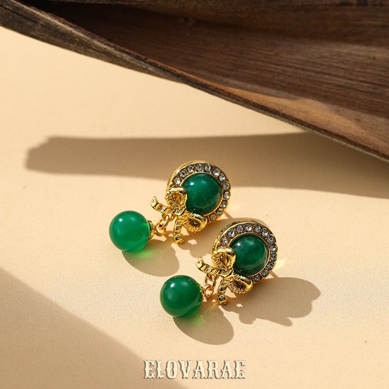 Amara Halo Butterfly Emerald Stud Earrings product image 4