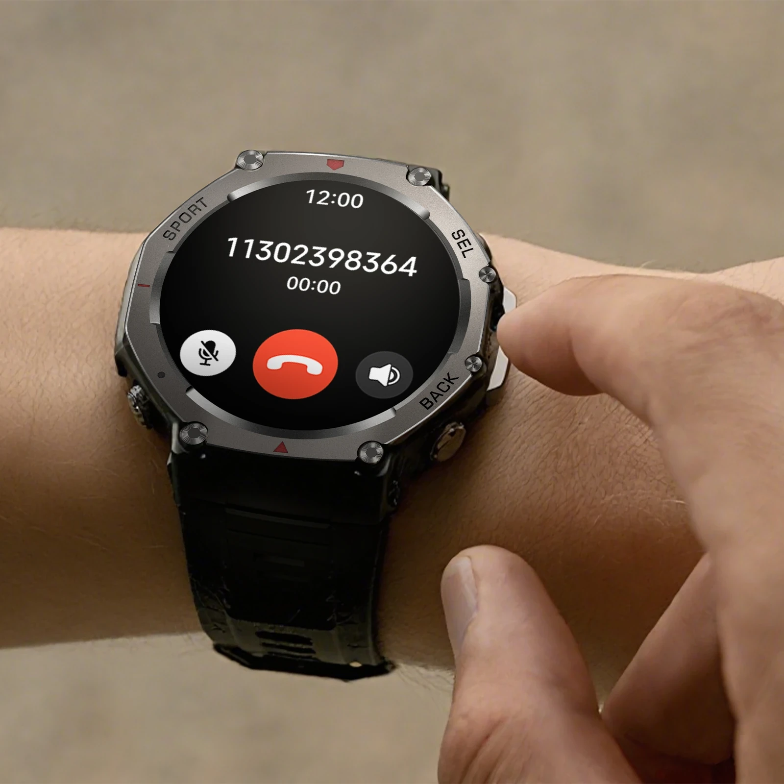 Rugged black and silver smartwatch with silicone strap on wrist displaying incoming call screen with red decline button.