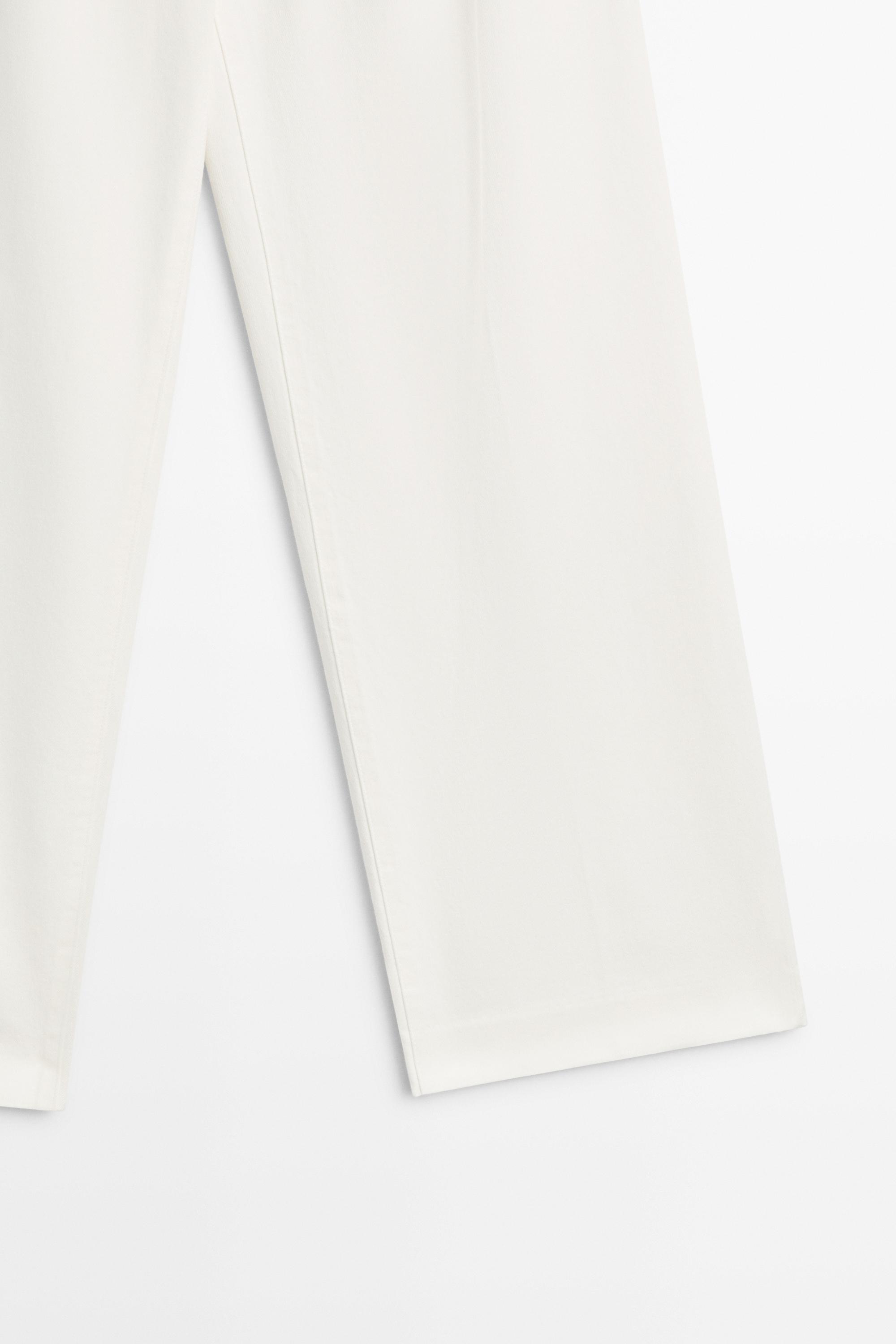 Low-rise wide-leg pleated pants - Off white