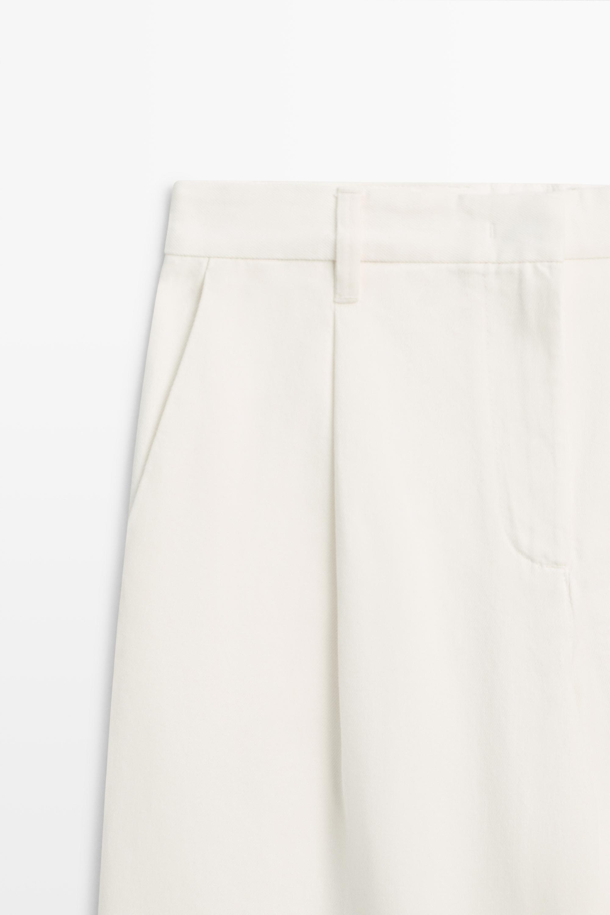 Low-rise wide-leg pleated pants - Off white