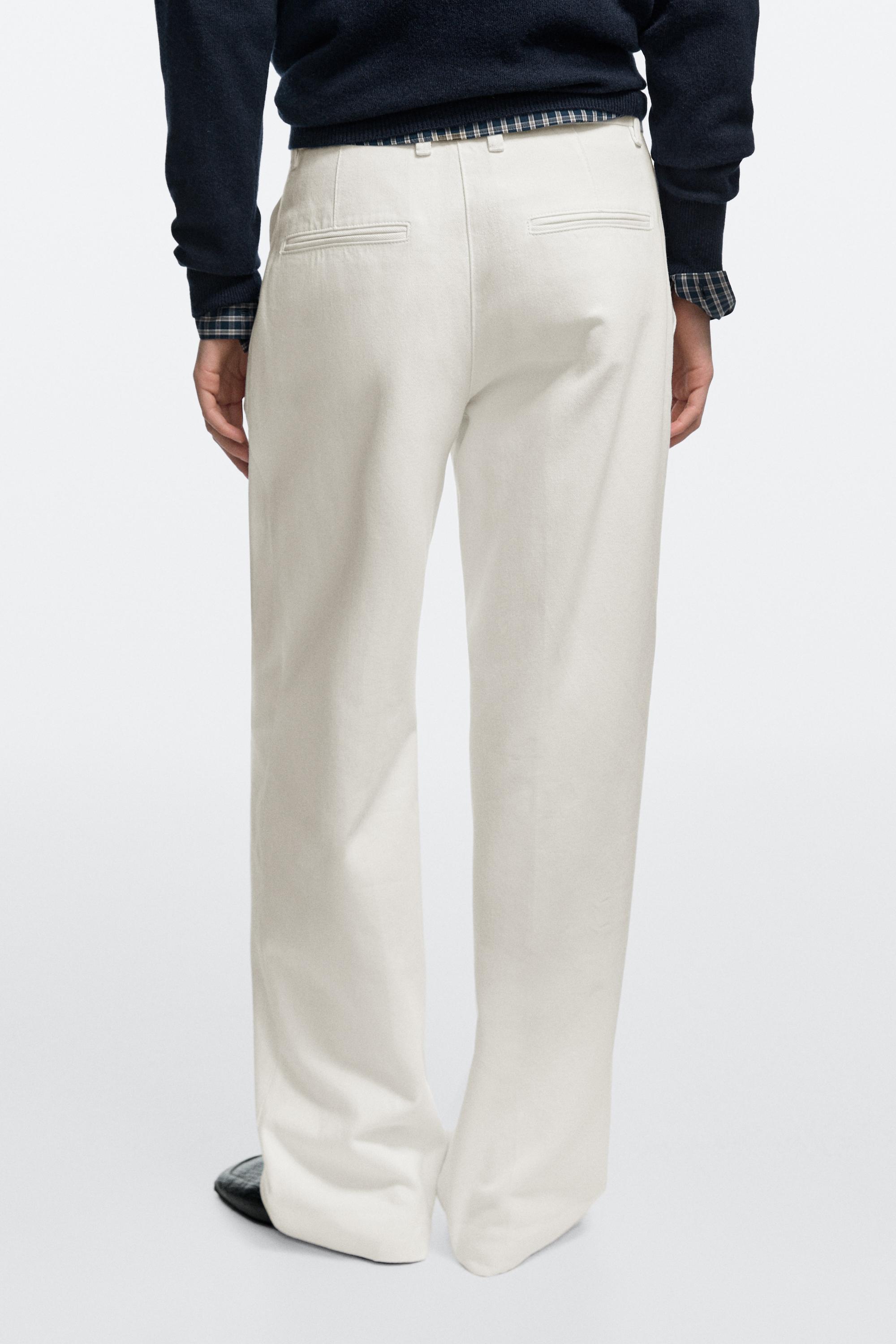 Low-rise wide-leg pleated pants - Off white