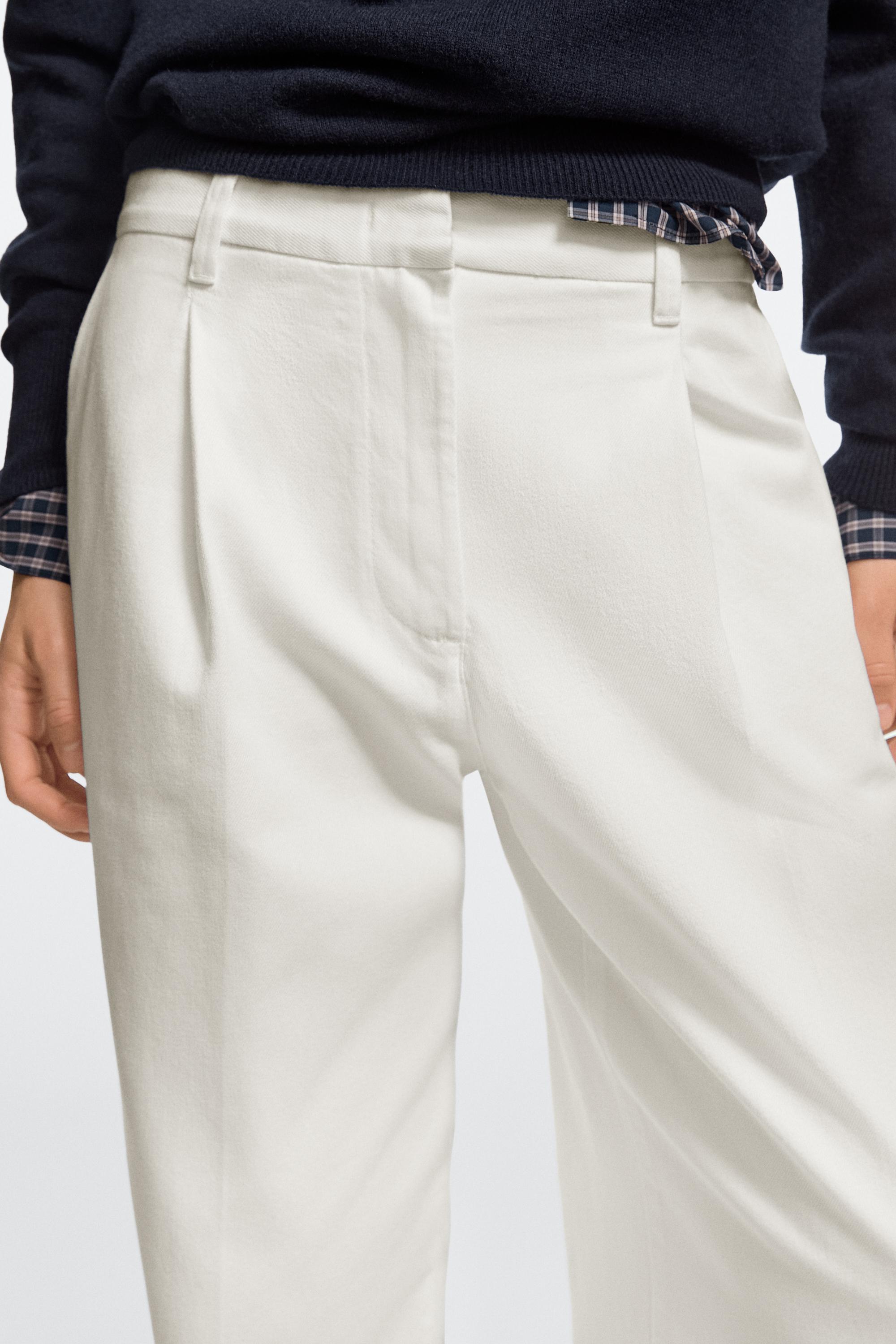 Low-rise wide-leg pleated pants - Off white