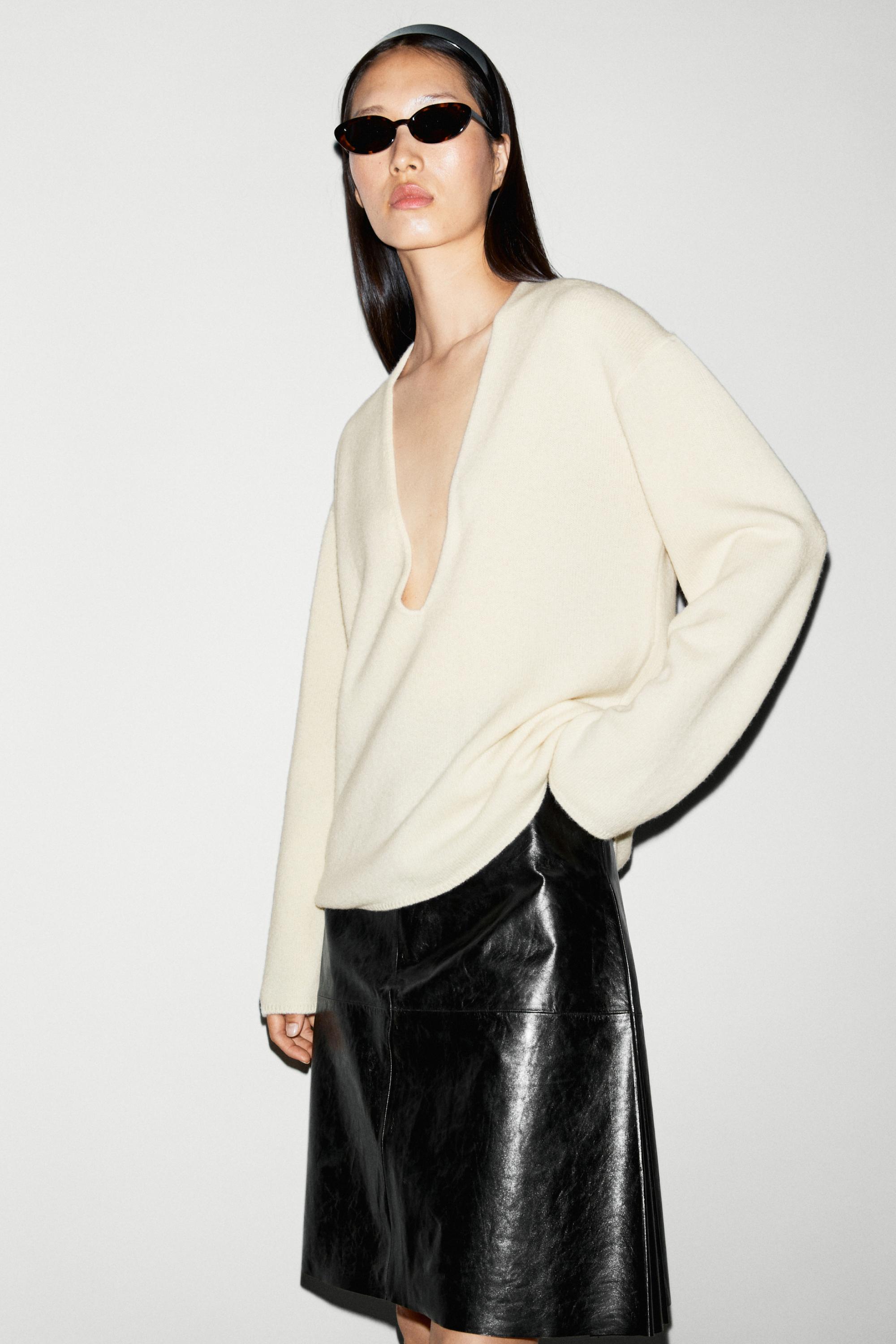Long-line knit sweater with neckline detail - OCHRE MARL