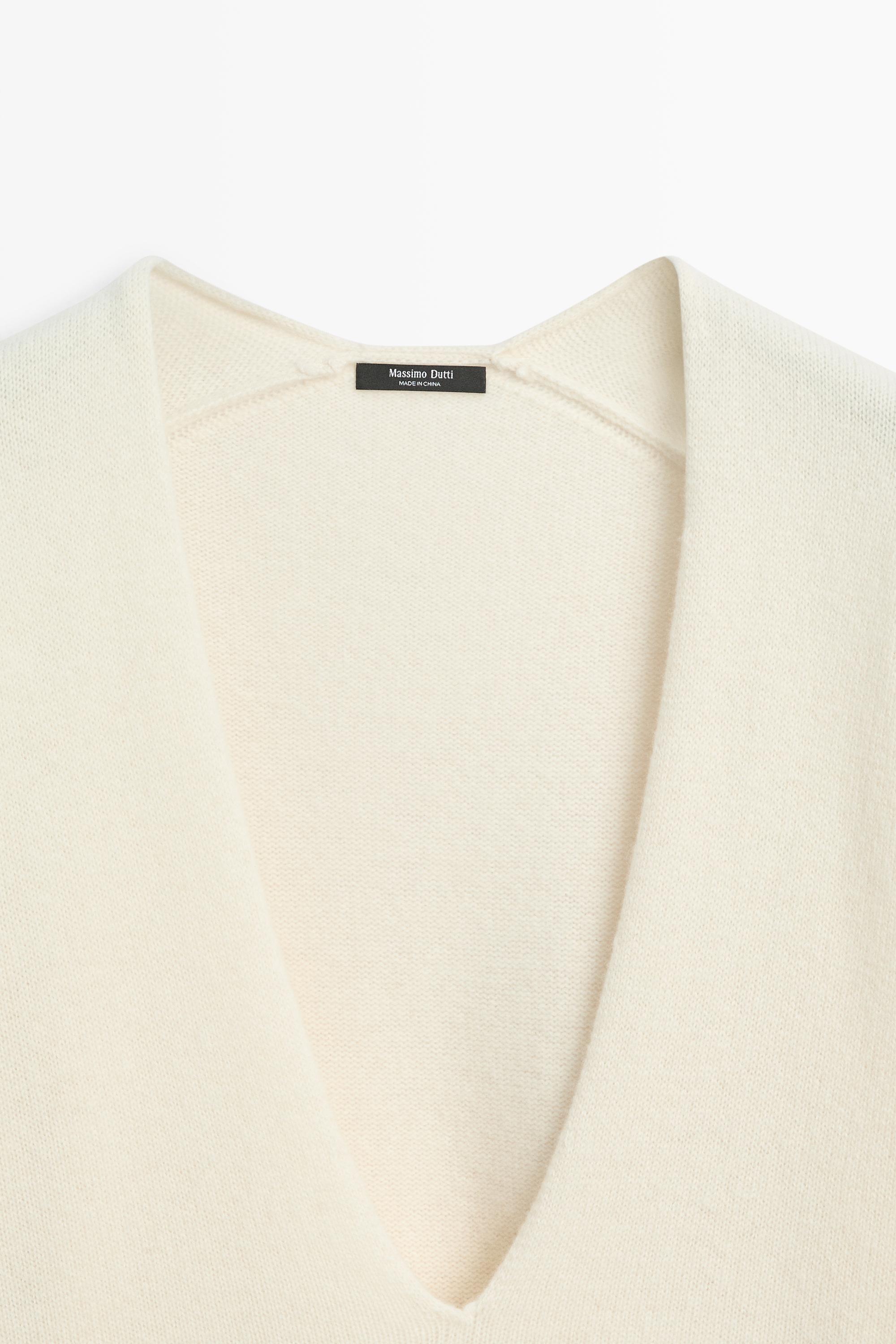 Long-line knit sweater with neckline detail - OCHRE MARL