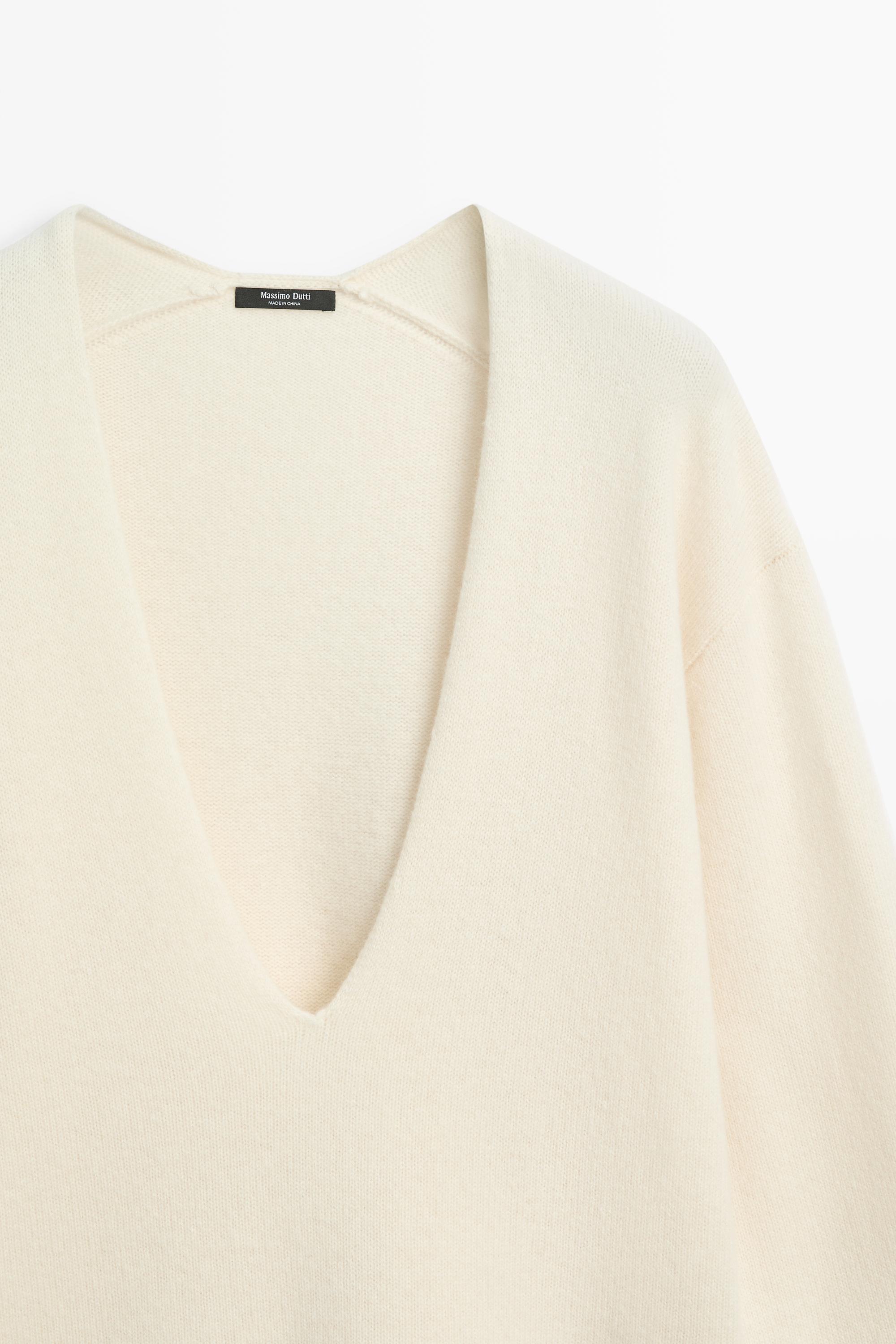 Long-line knit sweater with neckline detail - OCHRE MARL