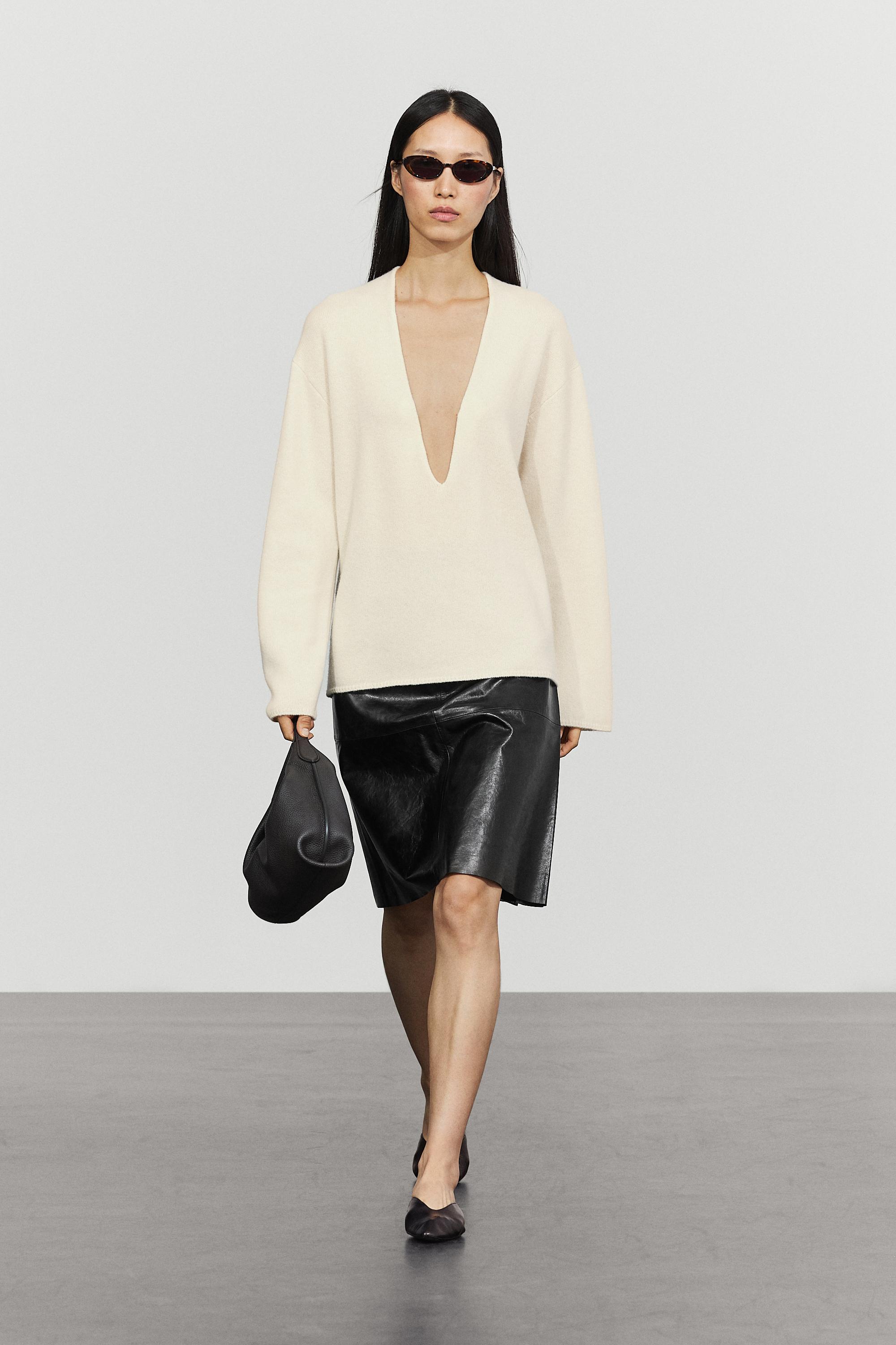 Long-line knit sweater with neckline detail - OCHRE MARL