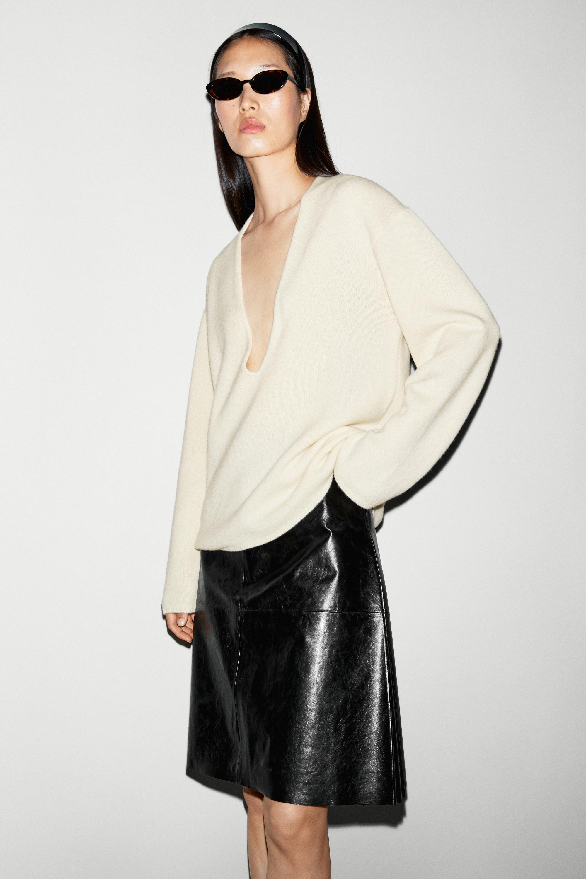 Long-line knit sweater with neckline detail - OCHRE MARL