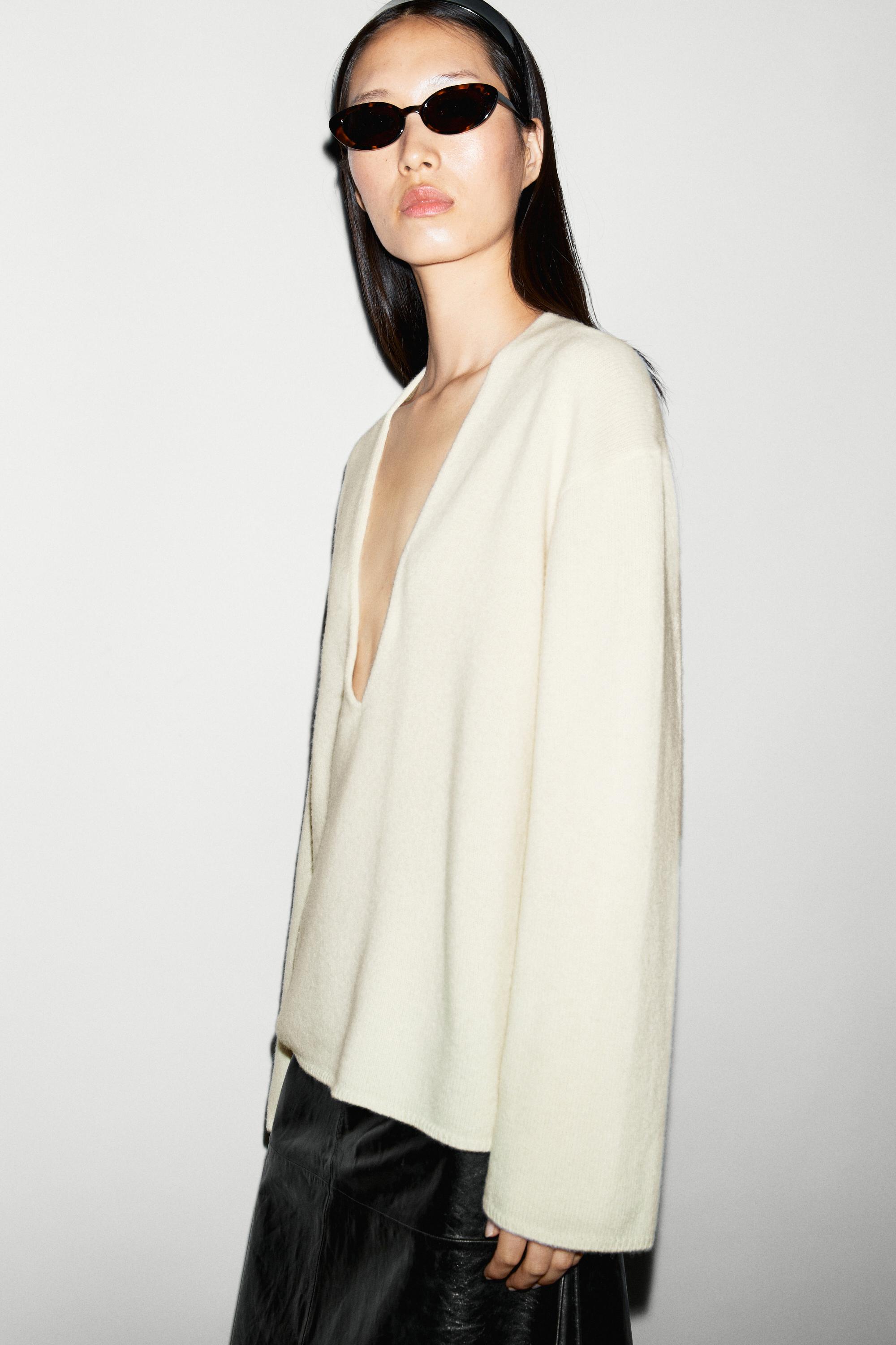 Long-line knit sweater with neckline detail - OCHRE MARL