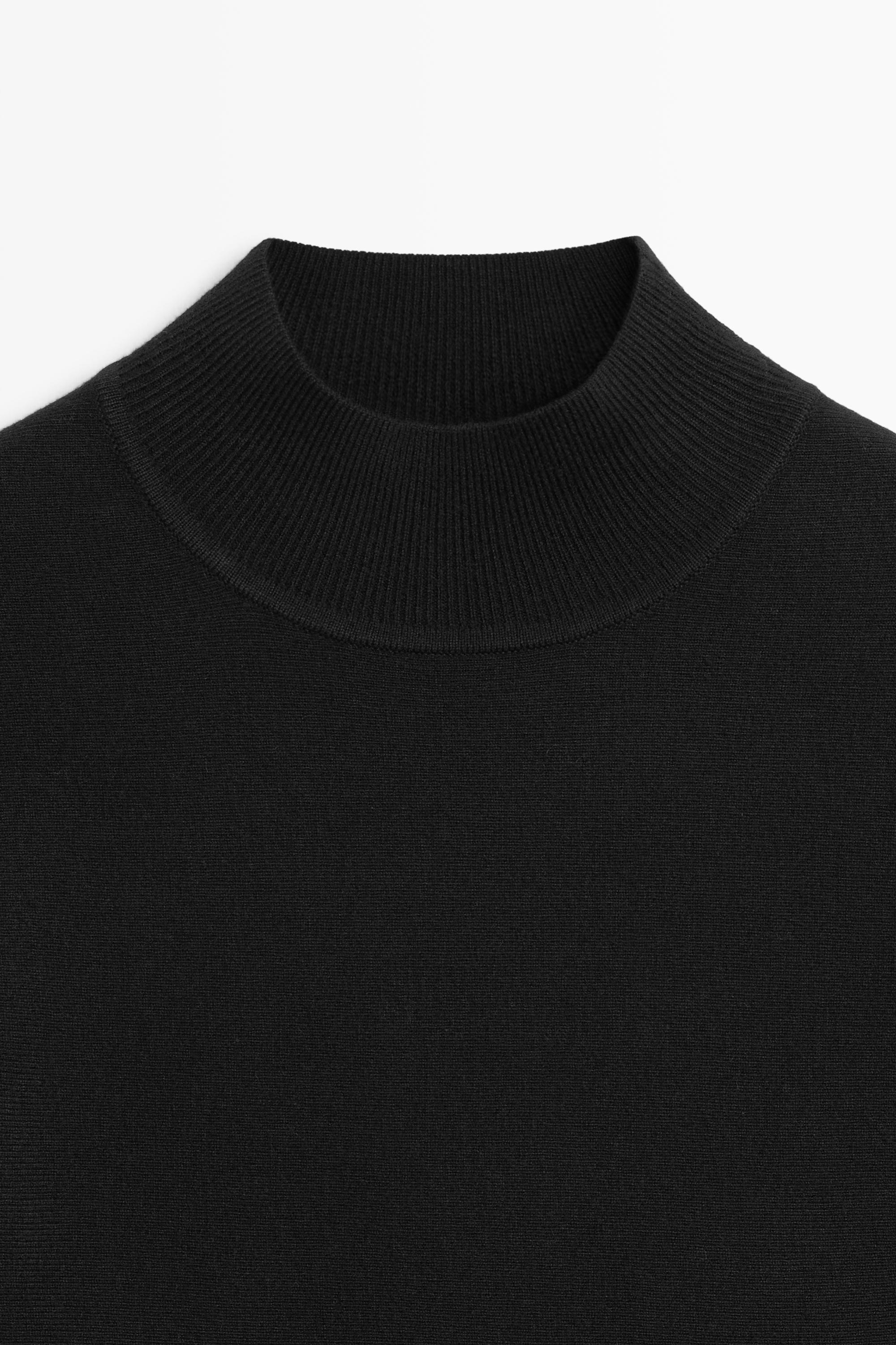 Peplum detail knit top - BLACK