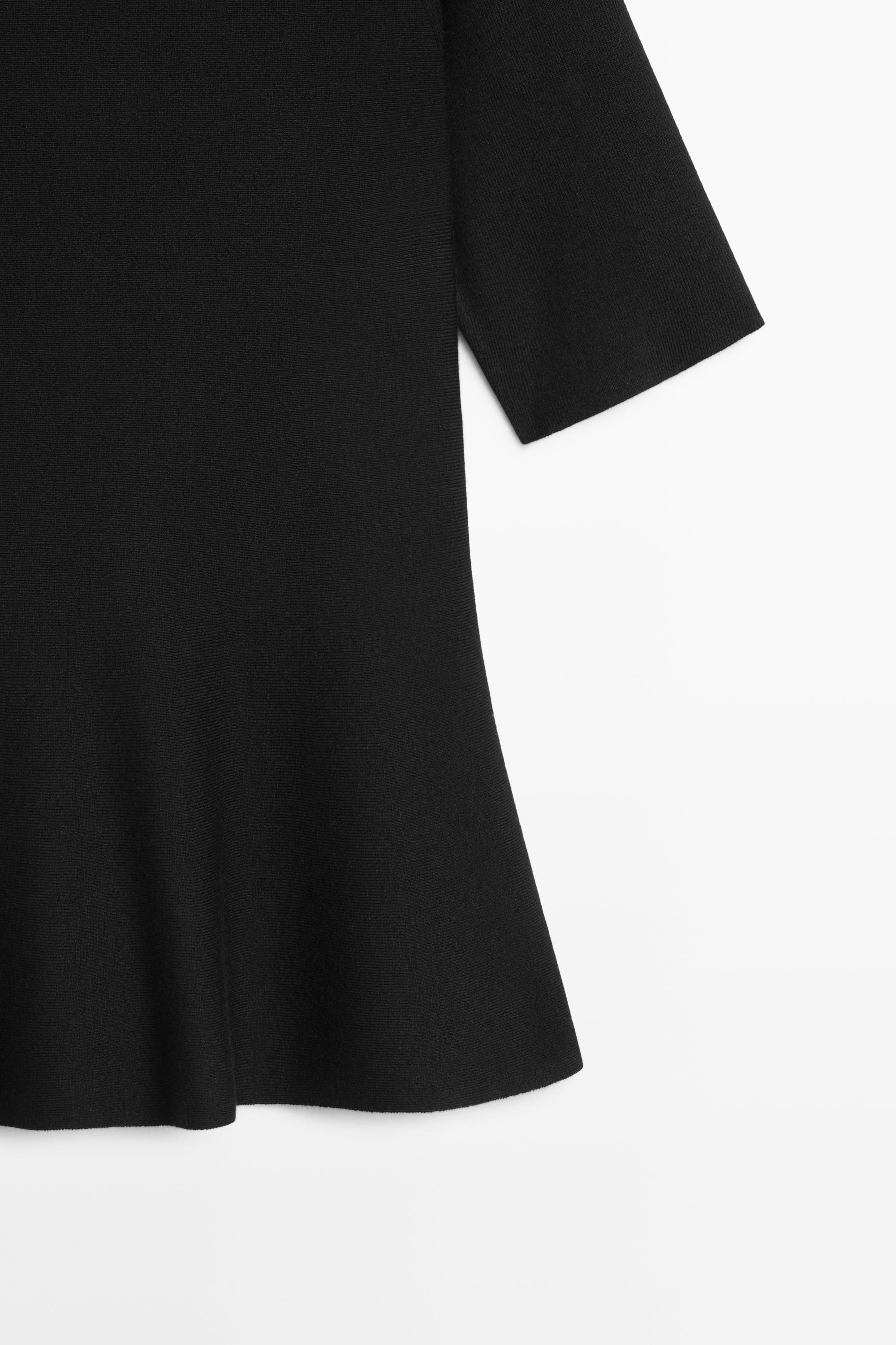 Peplum detail knit top - BLACK