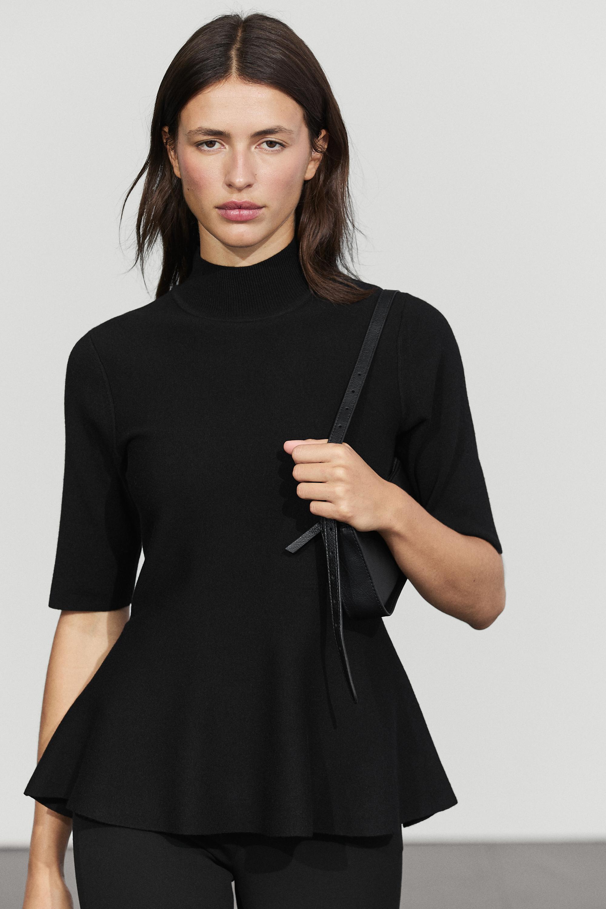 Peplum detail knit top - BLACK