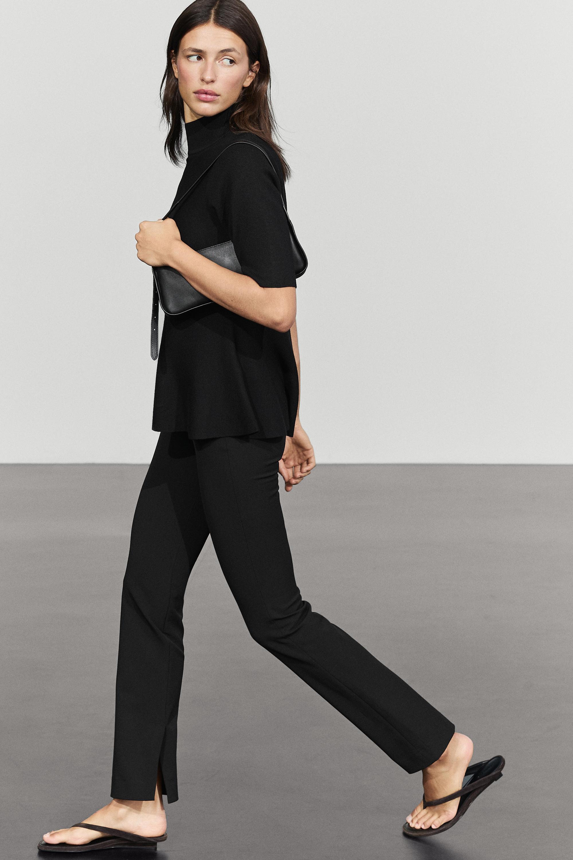 Peplum detail knit top - BLACK