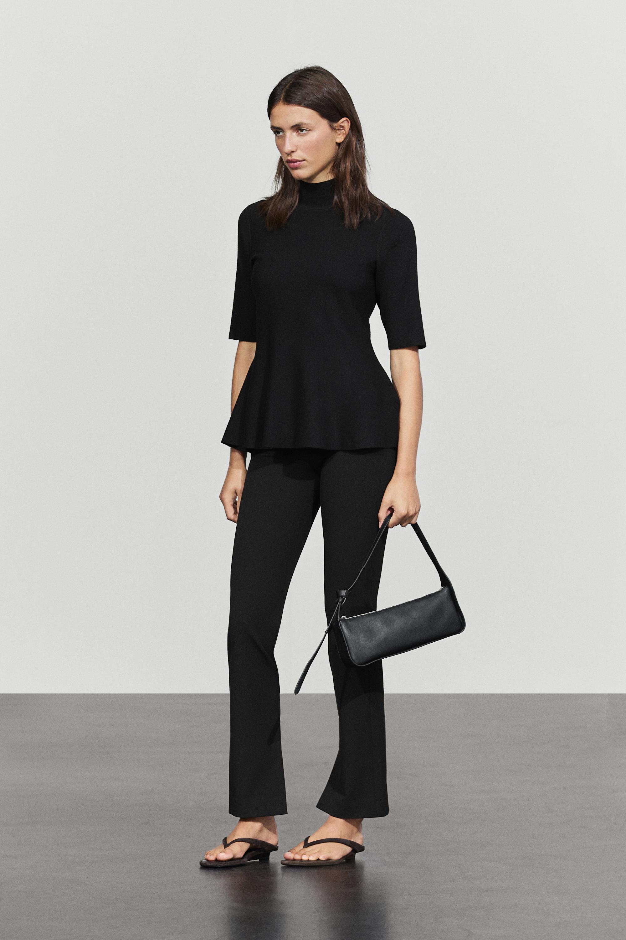 Peplum detail knit top - BLACK