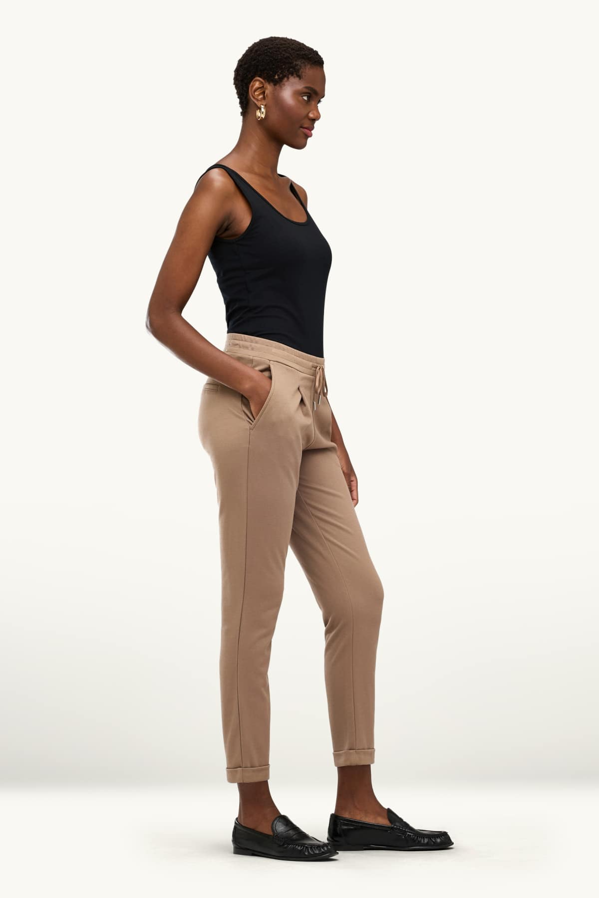 Cloth trousers - mid-rise waist - tapered fit - light brown