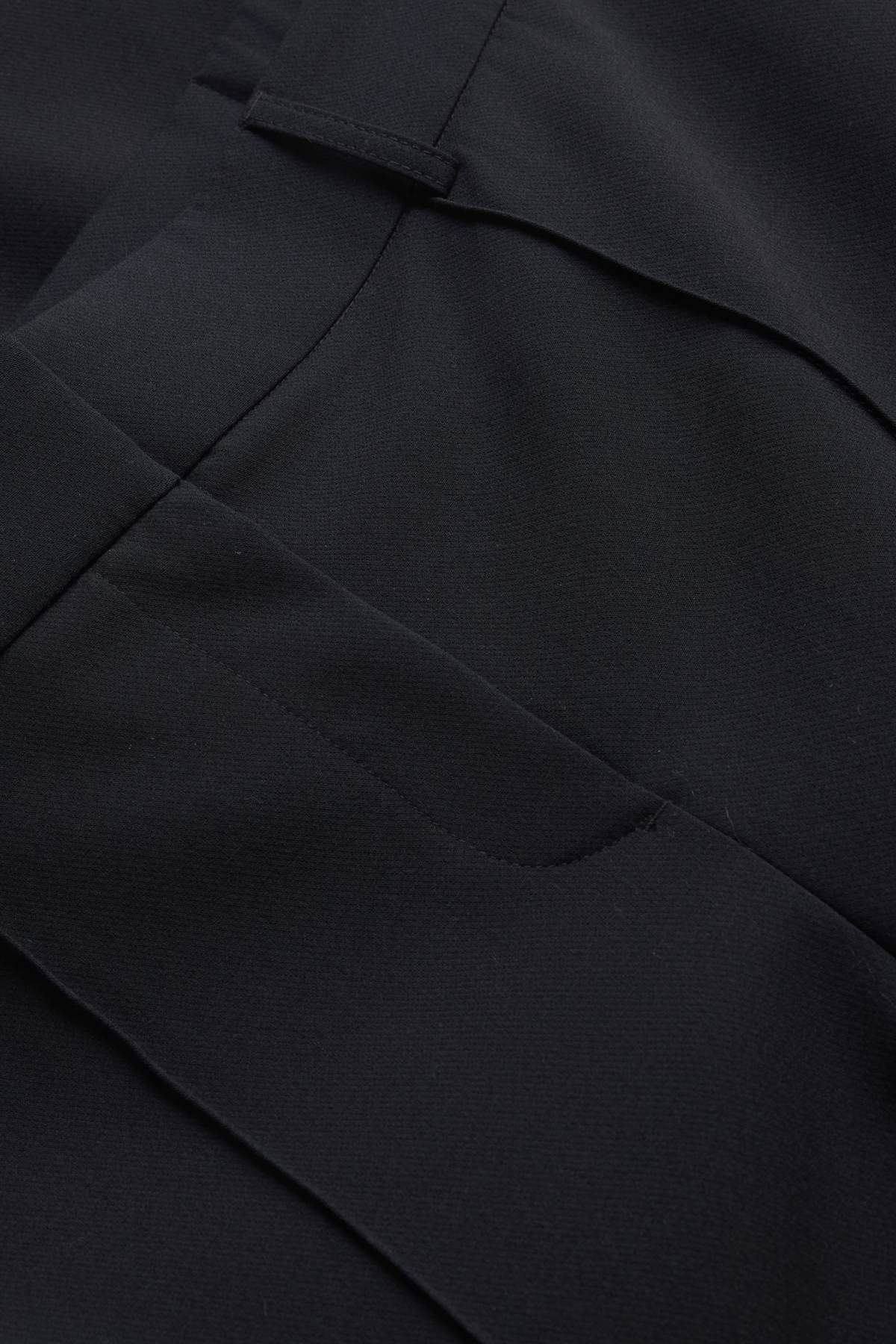 Cloth trousers - mid-rise waist - flared - black