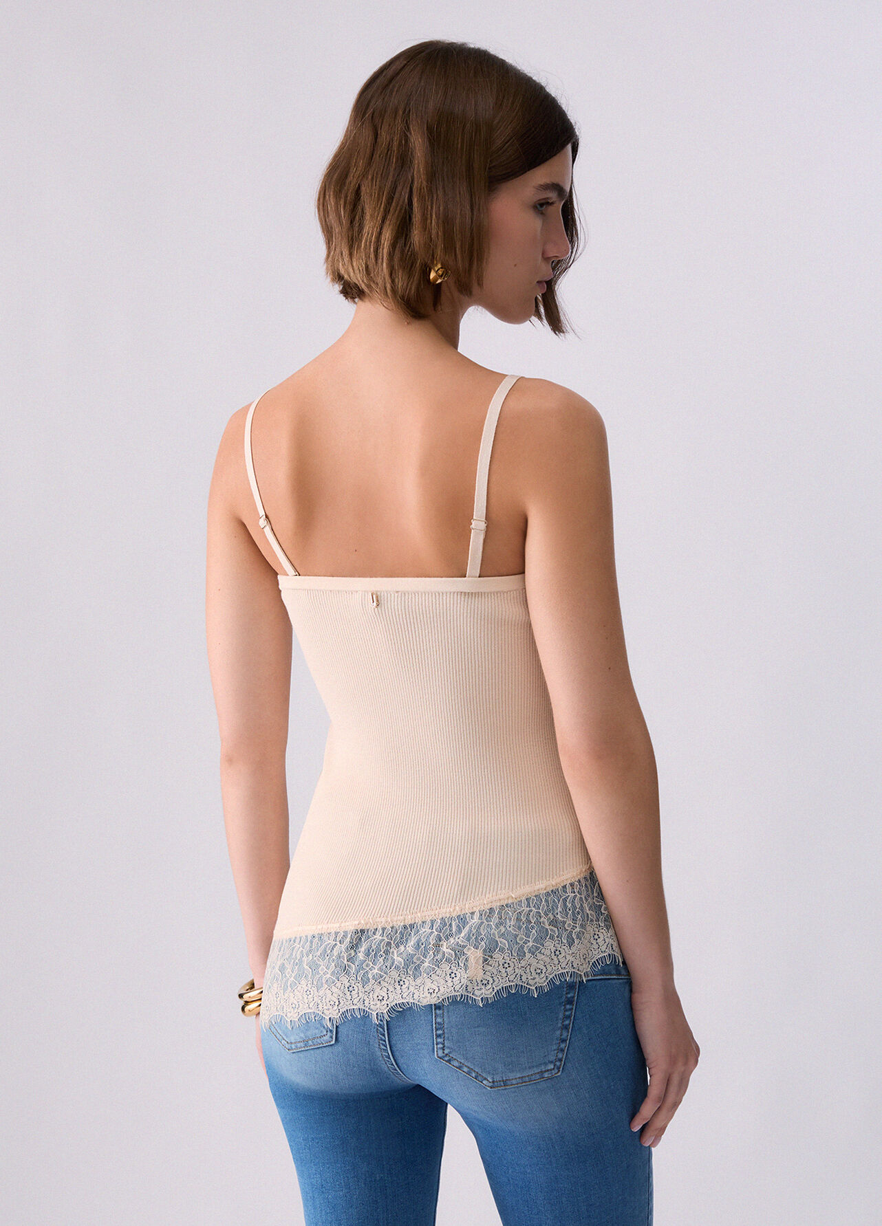 Top asimmetrico con dettagli in pizzo - CREAM