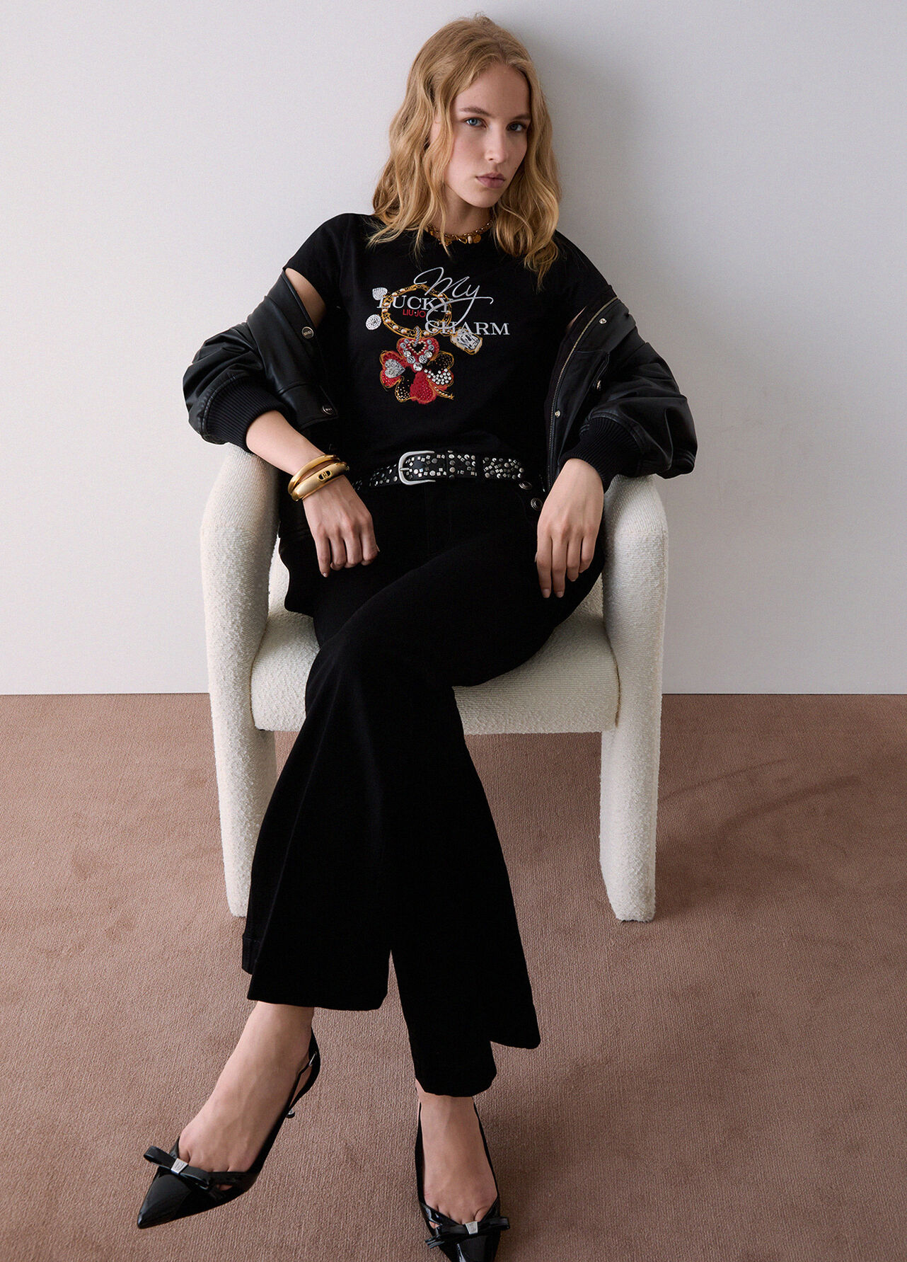 Jeans flare con bottoni gioiello - BLACK DENIM