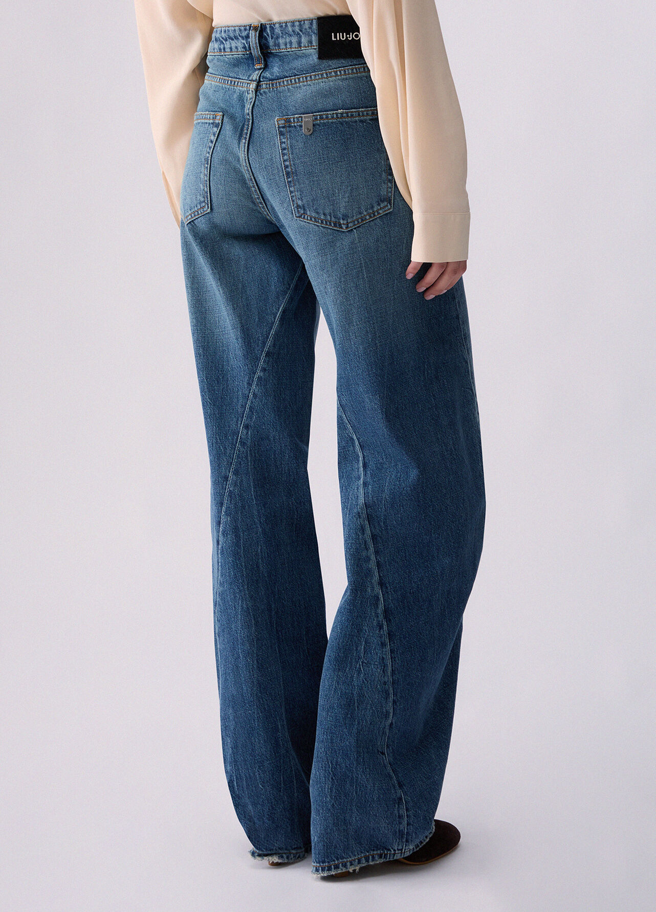 Jeans con cuciture asimmetriche - BLUE DENIM