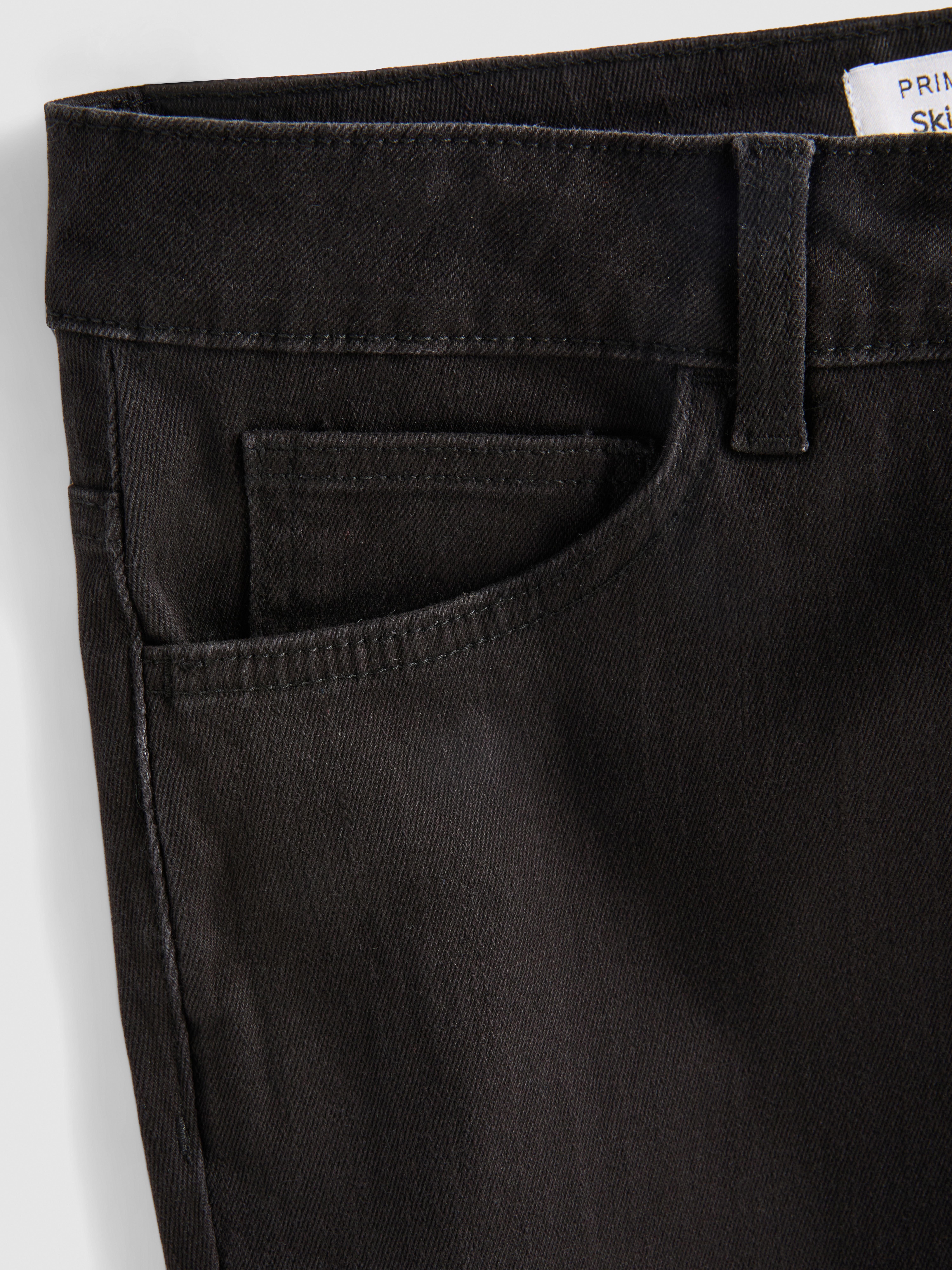 Mid-Rise Skinny Jeans - Black