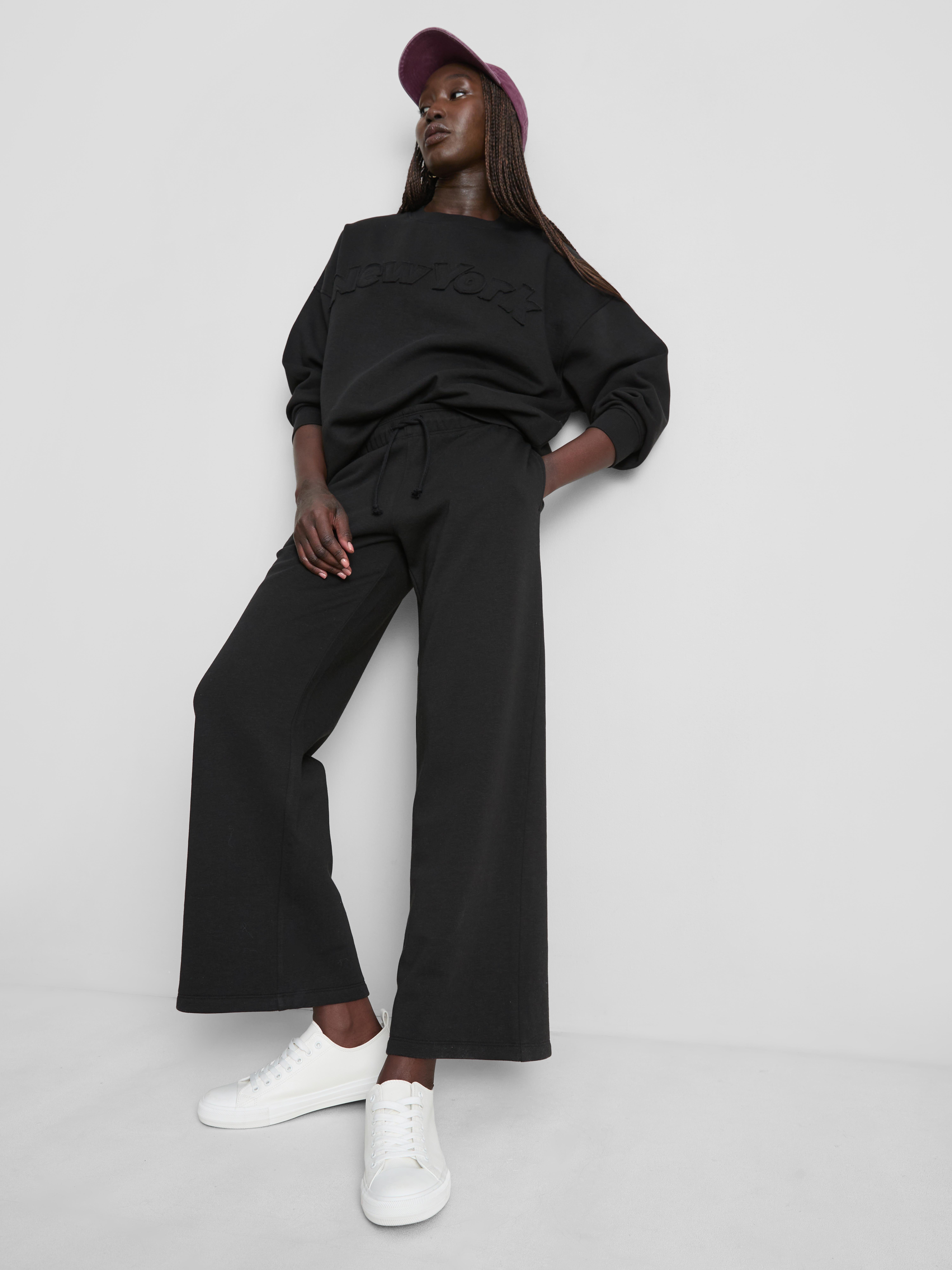 Cotton-Rich Wide-Leg Appliqué Joggers - Black
