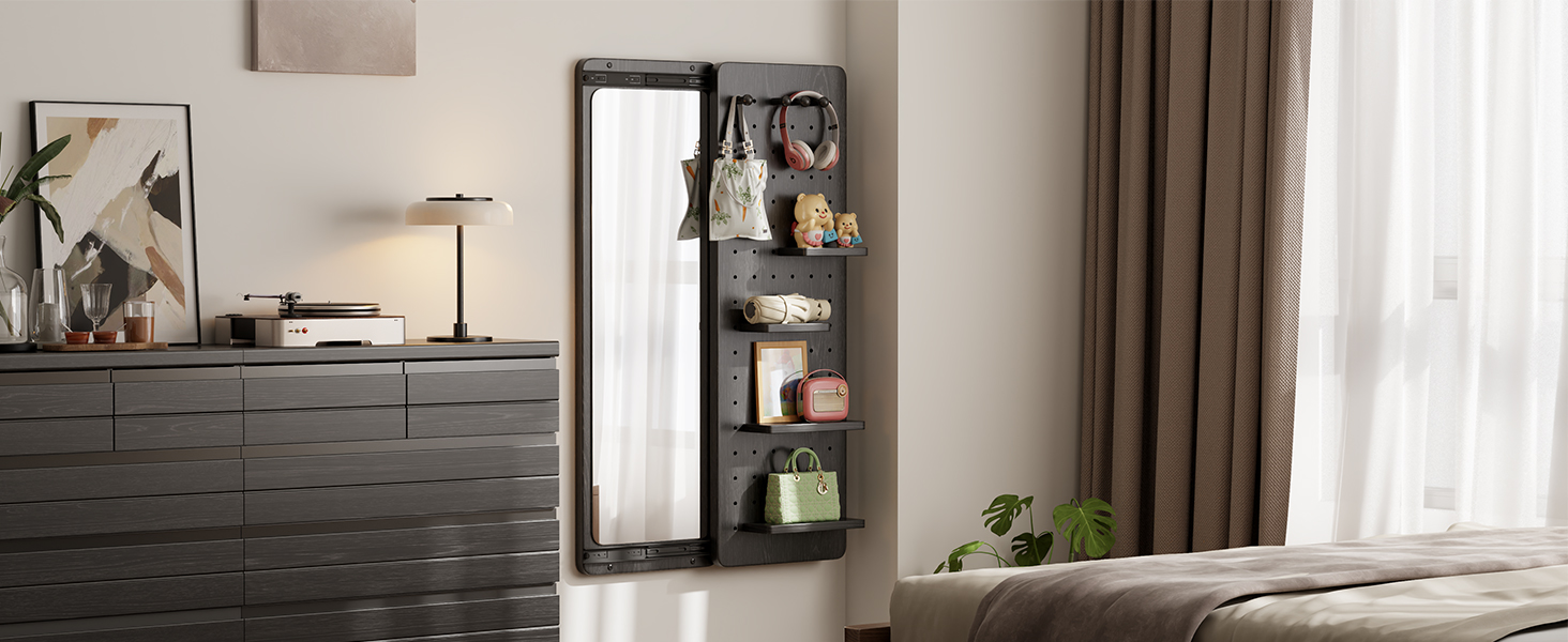 A wall mirror hangs on the bedroom wall.
